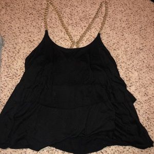 Black shirt with gold chain straps